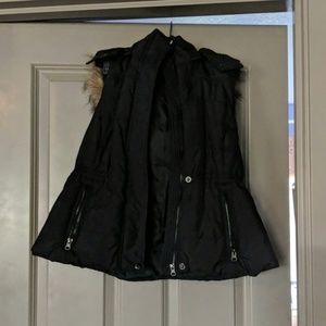 Vest with hood